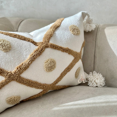 Handmade cushion cover with white, diamond and beige polka dot pompoms