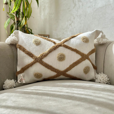 Handmade cushion cover with white, diamond and beige polka dot pompoms