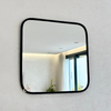 Square mirror in black brass