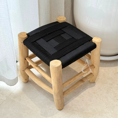 Wooden stool and black Kittane