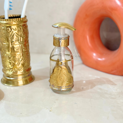 Adrar glass and gold brass soap dispenser
