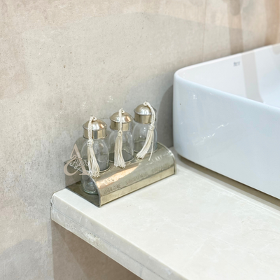 Set of 3 glass bottles with silver-plated brass holder for bathroom