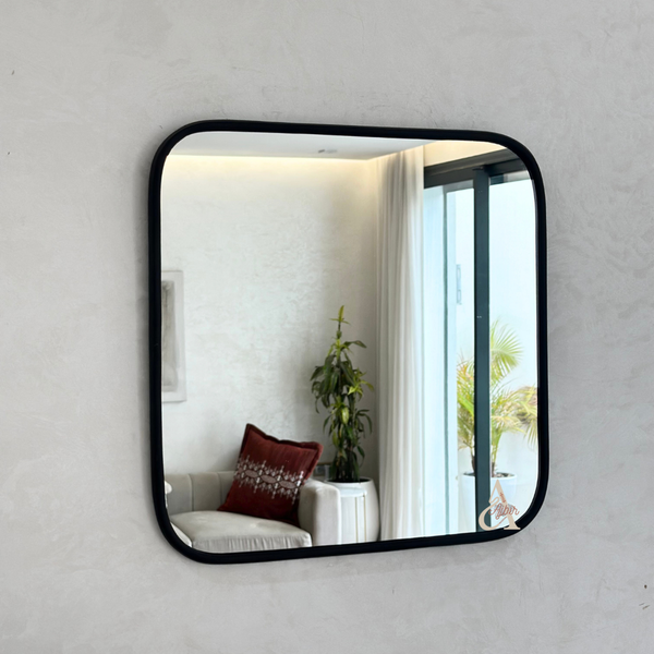 Square mirror in black brass