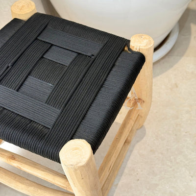Wooden stool and black Kittane