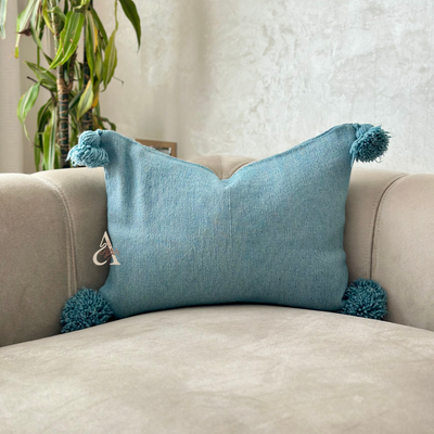 Handmade cushion cover with turquoise pompoms 50cmx40cm