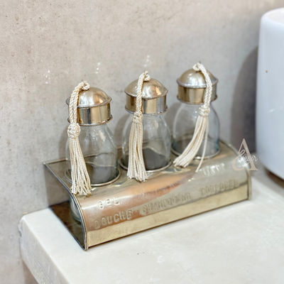Set of 3 glass bottles with silver-plated brass holder for bathroom