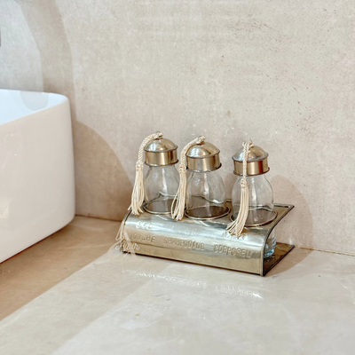 Set of 3 glass bottles with silver-plated brass holder for bathroom