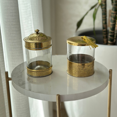 Golden glass and brass sugar bowl