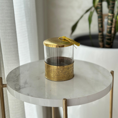 Golden glass and brass sugar bowl