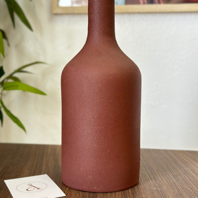 Iridescent brown bottle vase