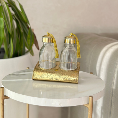 Set of 2 glass bottles with gold-plated brass stand Zwak