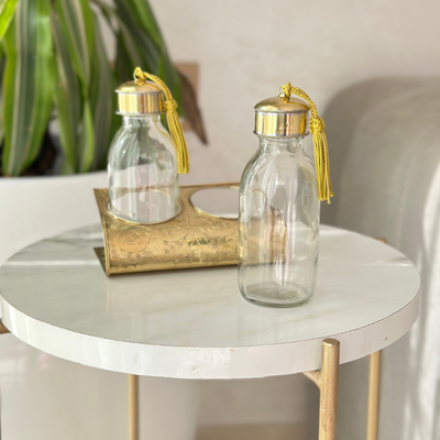 Set of 2 glass bottles with gold-plated brass stand Zwak