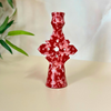 Speckled red candle holder