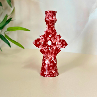 Speckled red candle holder