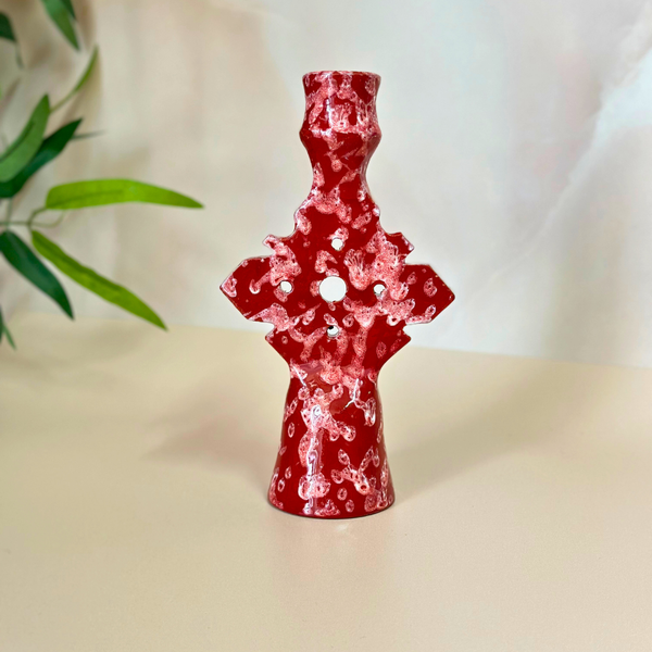 Speckled red candle holder