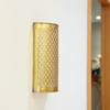 Khmissa wall light in gilded brass