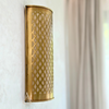 Khmissa wall light in gilded brass