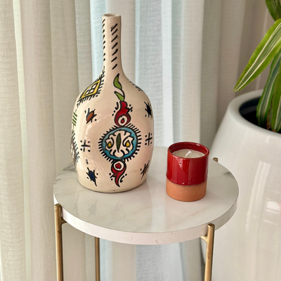 Red terracotta handmade candle with Oud scent