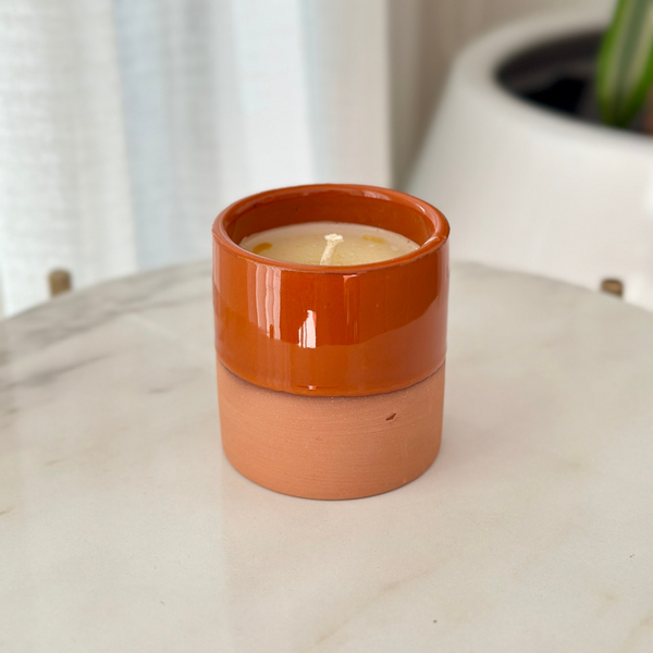 Orange terracotta handmade candle with Oud scent