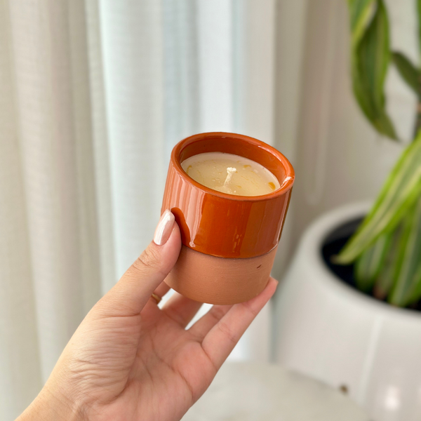 Orange handmade terracotta candle with jasmine scent