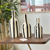Black striped bottle vase