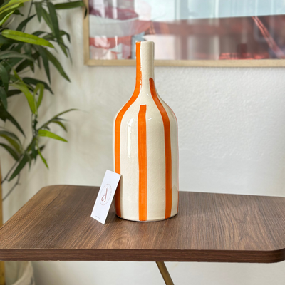 Striped orange bottle vase