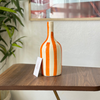 Striped orange bottle vase