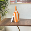 Striped orange bottle vase