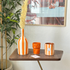 Striped orange bottle vase