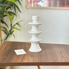 Modern white candle holder