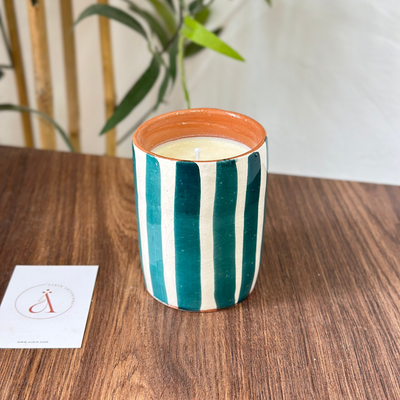 Handmade petroleum blue striped terracotta candle with orange blossom scent
