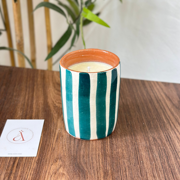 Handmade petroleum blue striped terracotta candle with orange blossom scent