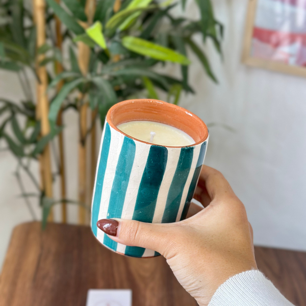 Handmade petroleum blue striped terracotta candle with orange blossom scent