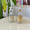 Distributeur de savon en verre et laiton doré Martelé - Ajbir