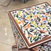 Square table in wood and colored resin
