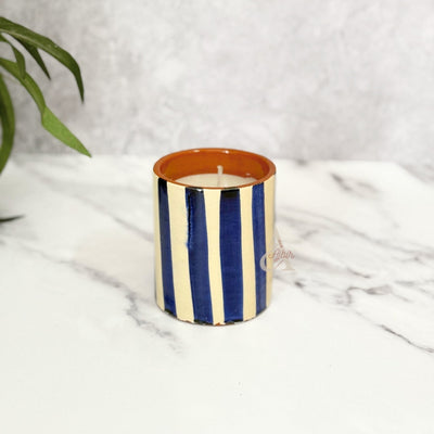 Handmade striped terracotta candle with Musk scent
