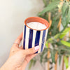 Handmade striped terracotta candle with Musk scent