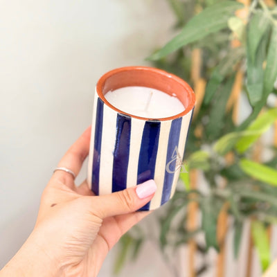 Handmade striped terracotta candle with Musk scent