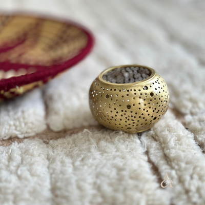 Round candle holder in gold-plated brass