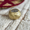 Round candle holder in gold-plated brass