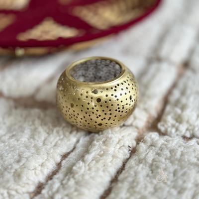 Round candle holder in gold-plated brass