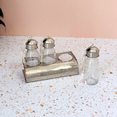 Set of 3 glass bottles with silver-plated brass holder for bathroom