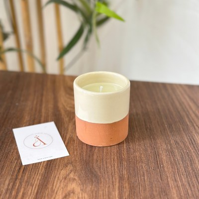 White handmade terracotta candle with Musk scent