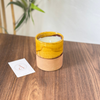 Yellow terracotta handmade candle with Oud scent