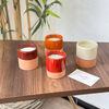 Red terracotta handmade candle with Oud scent