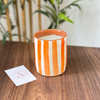 Orange striped handmade terracotta candle with Orange Blossom scent