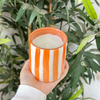 Orange striped handmade terracotta candle with Orange Blossom scent