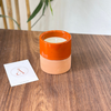 Handmade orange terracotta candle with Musk scent