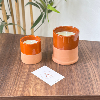 Handmade orange terracotta candle with Musk scent