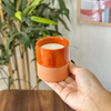 Orange handmade terracotta candle with jasmine scent